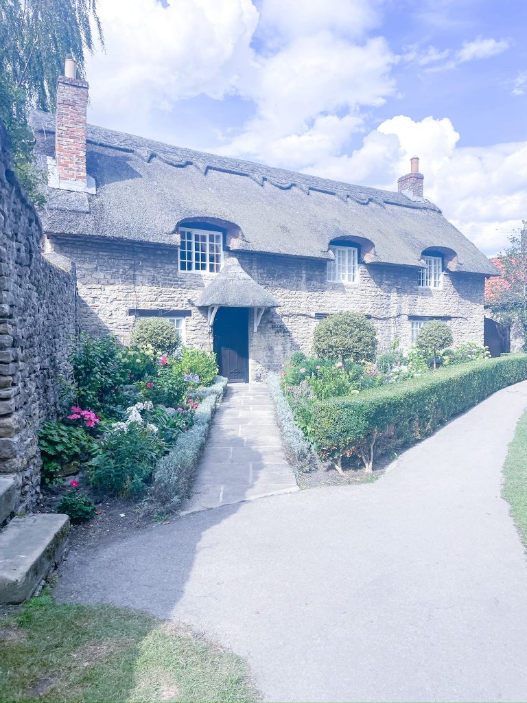 Image of a traditional thatched cottage in the village of Thornton Le Dale - How Felicity Finds